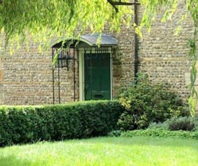 Property with Willow Tree in garden